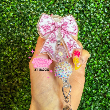 Elegant Pink Toile Bow Badge Reel