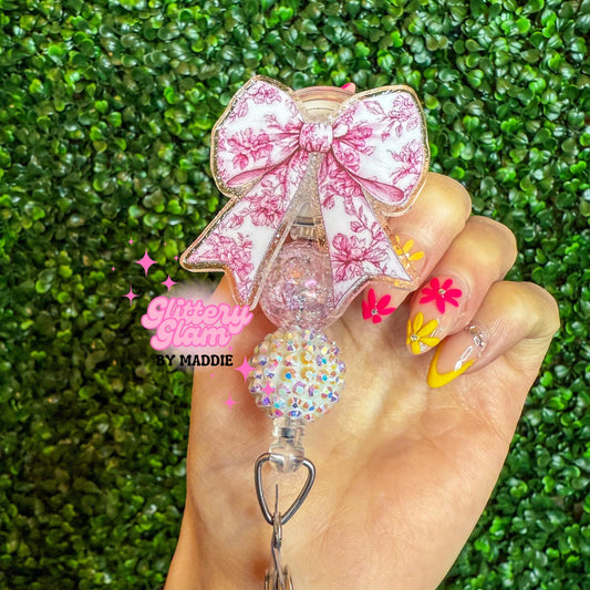 Elegant Pink Toile Bow Badge Reel